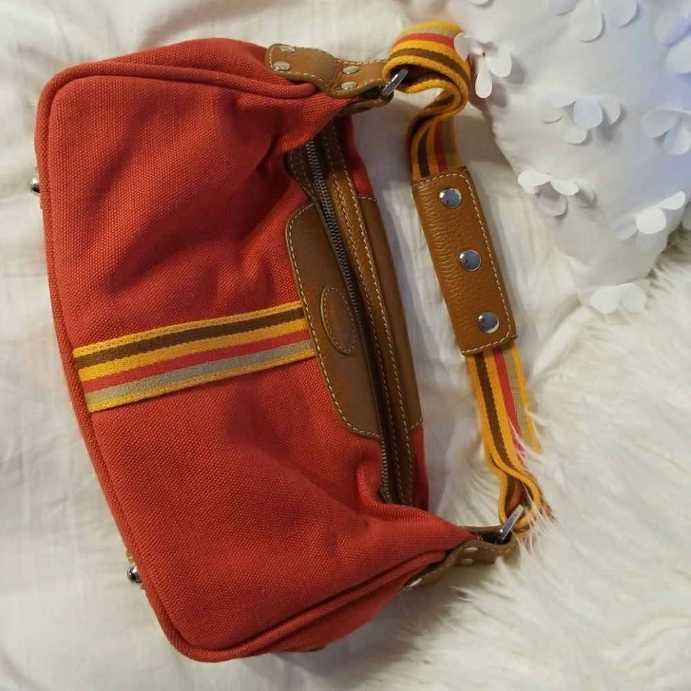 Completly new.   Tods handbag authorization!